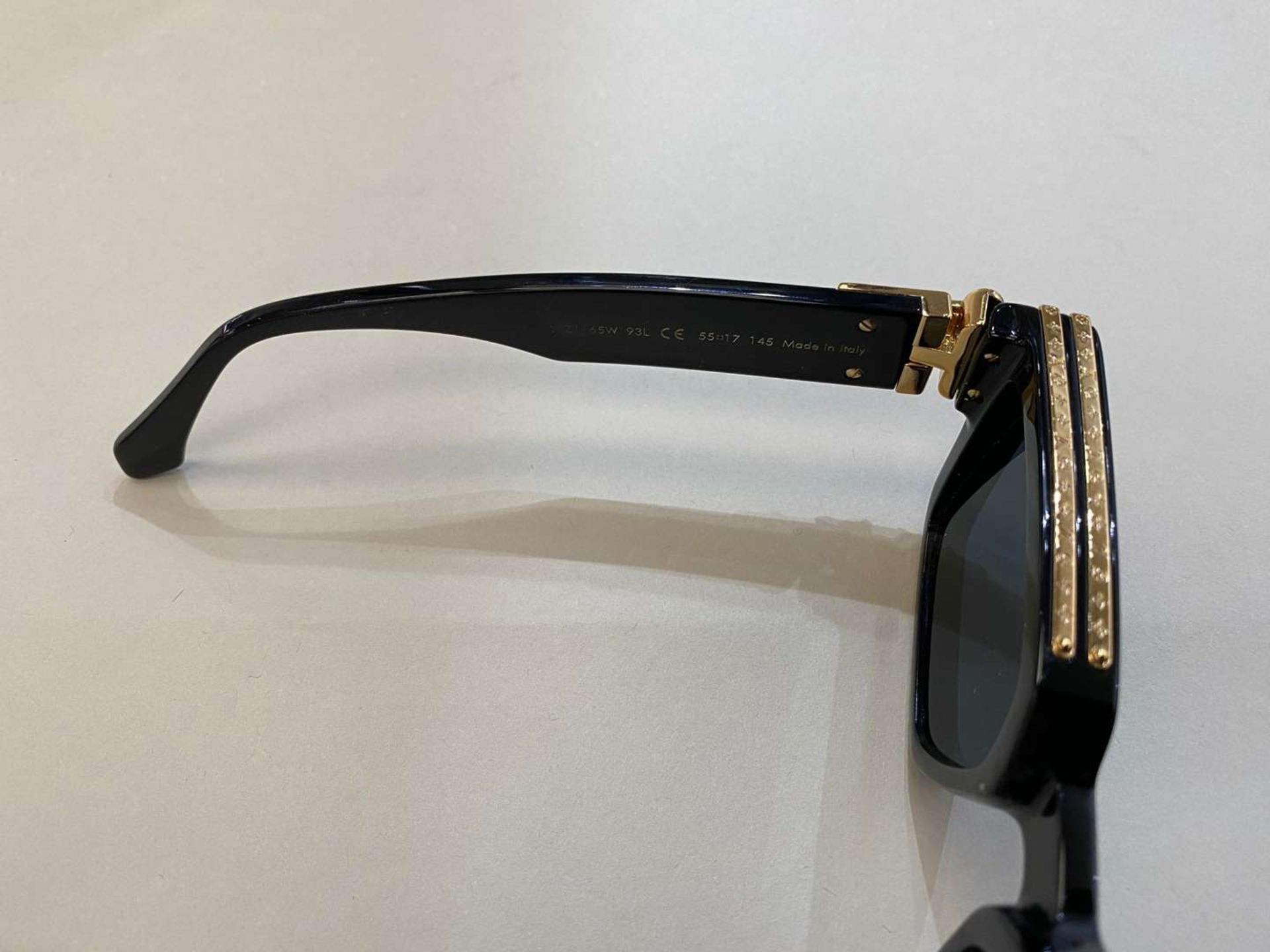 LOUIS VUITTON, a pair of Italian gilt highlighted, black framed sunglasses - Image 3 of 4