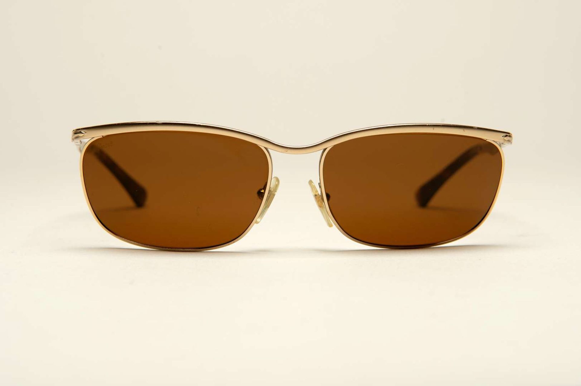 PERSOL, a pair of Italian gilt framed sunglasses