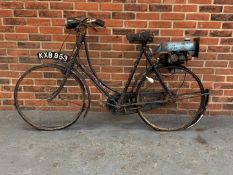 Trojan Mini Motor Attached to a Vintage Bicycle
