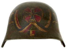 AN IMPERIAL GERMAN PAINTED ARMOURED FOREHEAD PLATE,