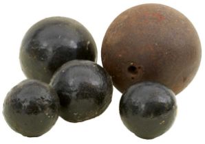 A COLLECTION OF FOURTEEN VARIOUS CANNON BALLS,