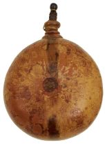 A CONTINENTAL SEED FORM CIRCULAR WOODEN POWDER FLASK,