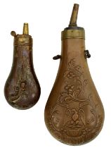A POCKET-SIZED EMBOSSED POWDER FLASK,