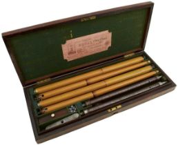 A RARE CASED PAIR OF LACQUERED AIR CANES BY REILLY,