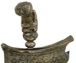 A 19TH CENTURY WHITE METAL SULAWESI KRIS,