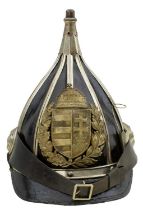 AN EARLY 20TH CENTURY ROYAL HUNGARIAN POLICE OTHER RANKS HELMET,