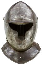 A 17TH CENTURY ENGLISH CLOSE HELMET OF TOTENKOPF OR SAVOYARD FORM,