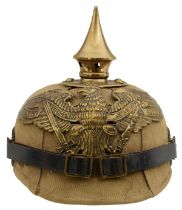 A COPY OF THE SCARCE CLOTH COVERED CORK PRUSSIAN PICKELHAUBE,