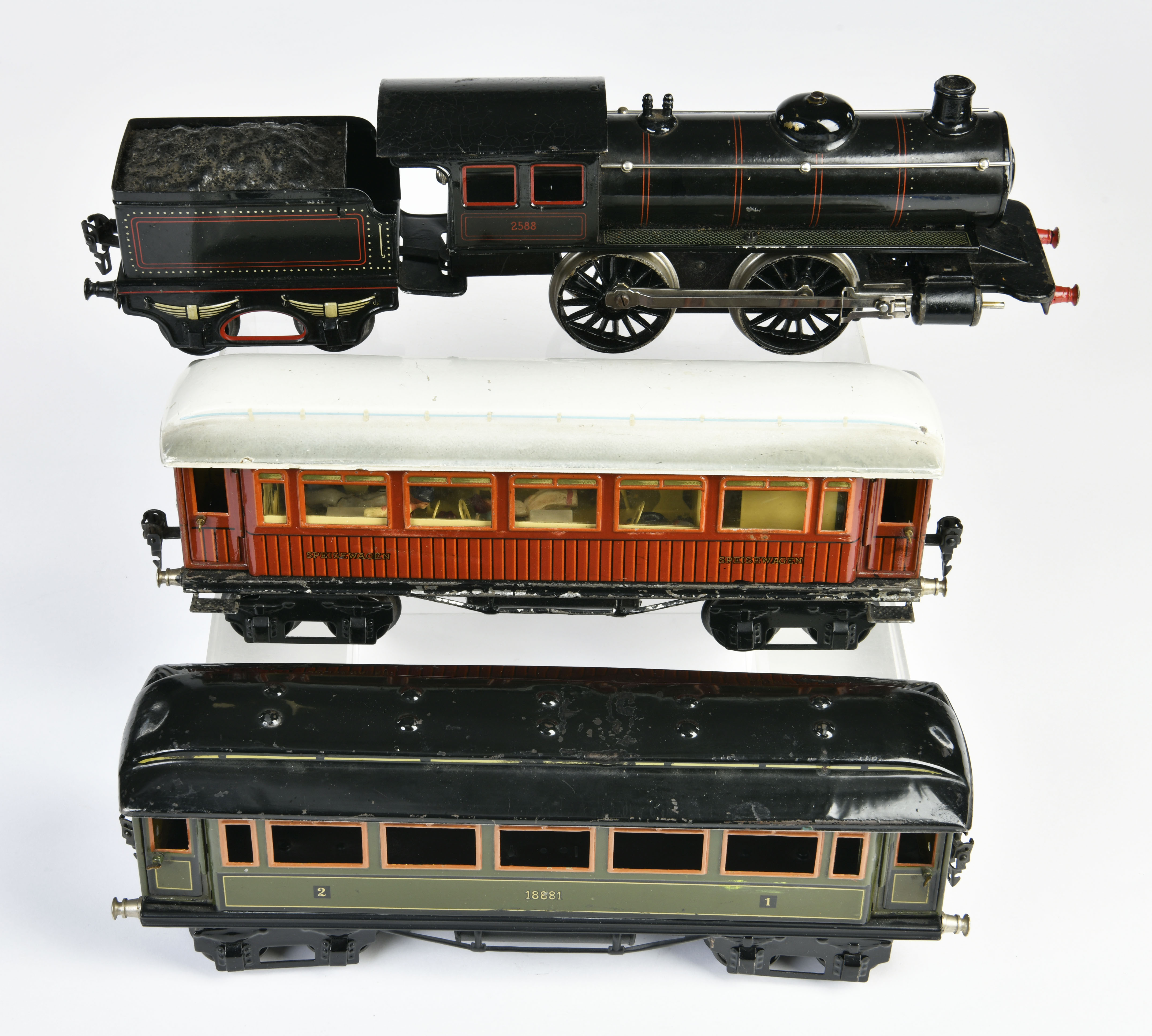 Märklin, loco 2588 with tender and 2 wagons, gauge 1, one wagon with interior and figures, cw ok,