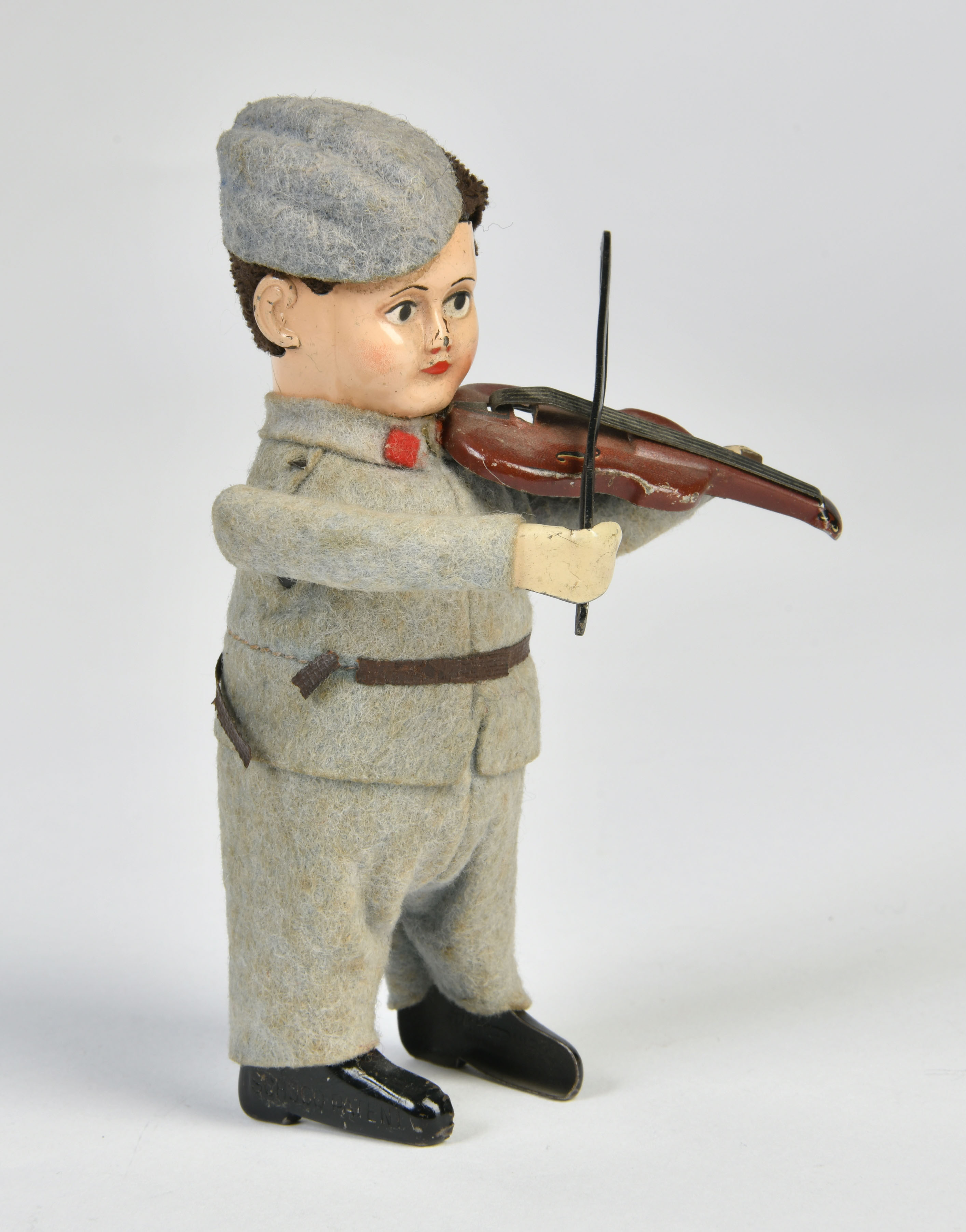 Schuco, Swiss guardsman with violin, Germany pw, 13,5 cm, mixed constr., cw ok, paint d., C 2+