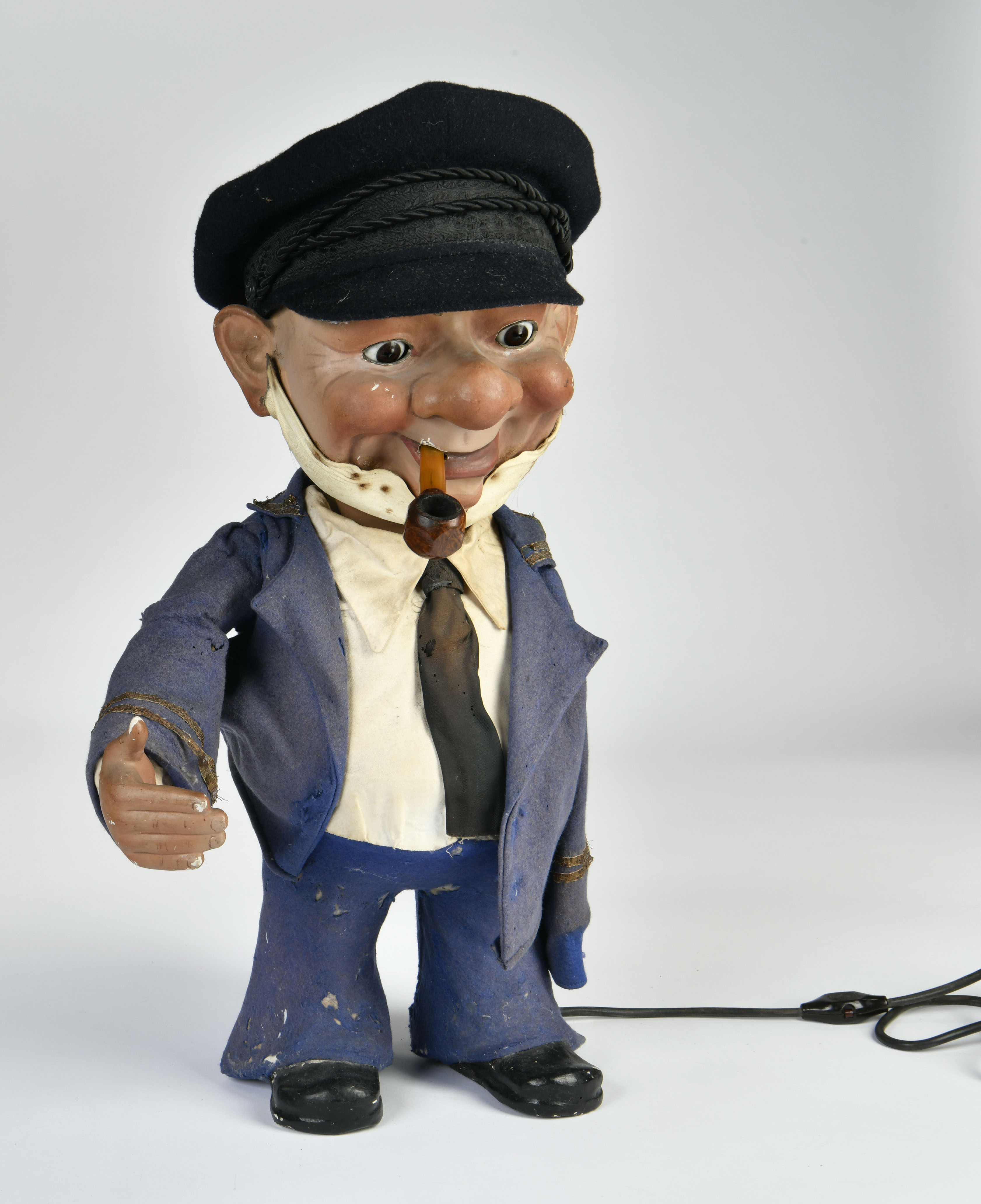 Advertising automaton "captain", bobblehead with limber eyes, electric drive is stiff, one arm is