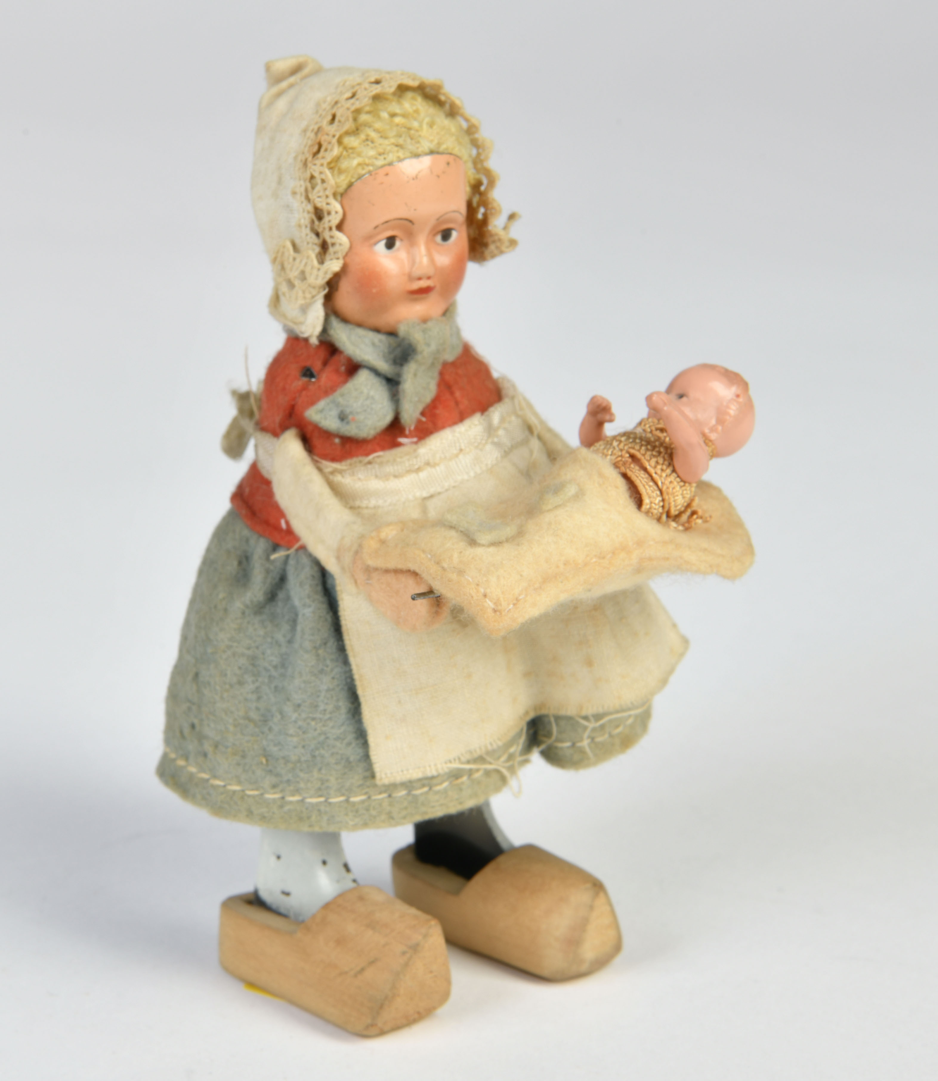 Schuco, Dutch woman with baby, Germany, cw ok, 12 cm, clothes slightly dirty, C 1-2