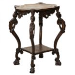 Carved wooden table in neo-Rococo style from the turn of the 19th century.