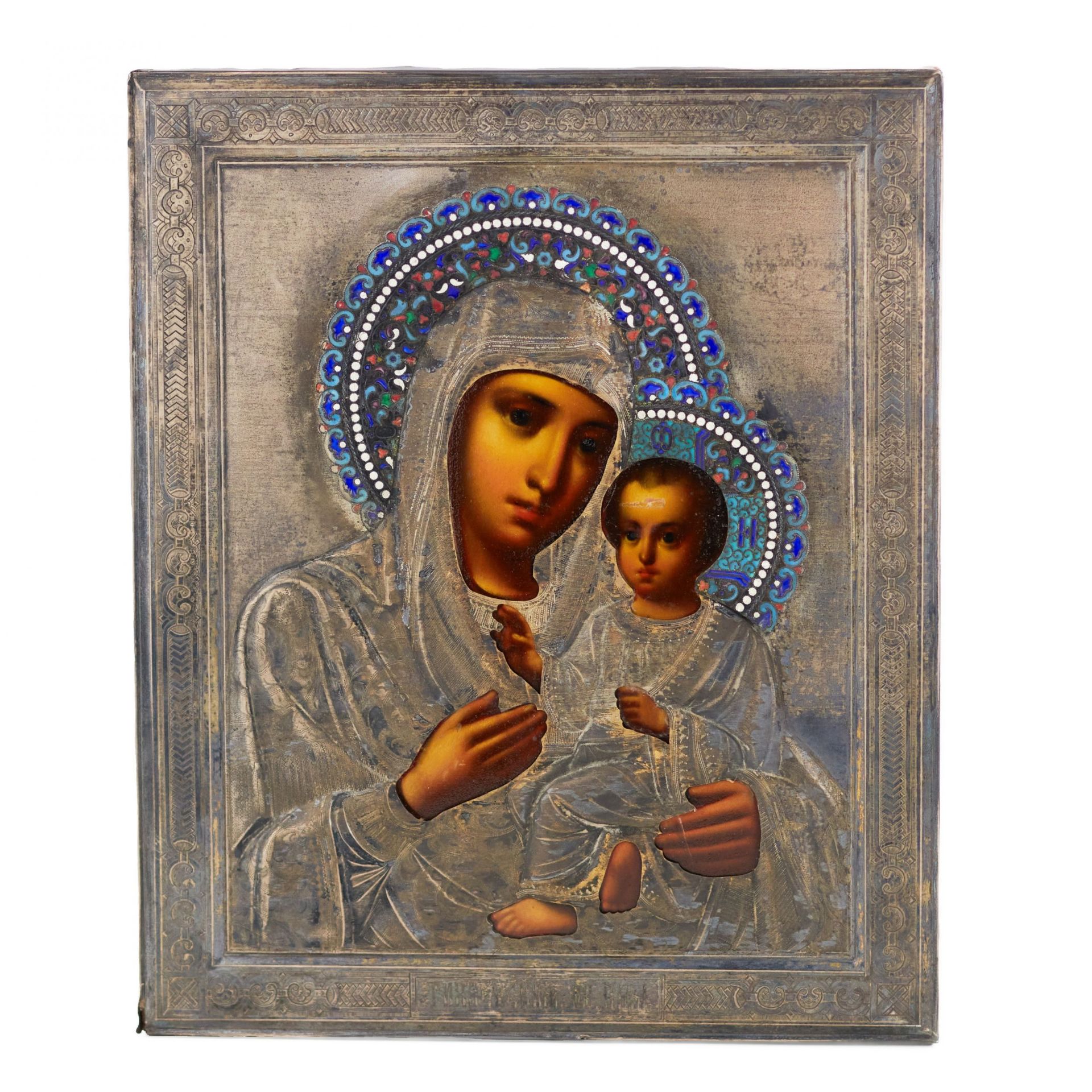 Icon of the Tikhvin Most Holy Theotokos in a silver frame and with cloisonne enamel. 1899-1908