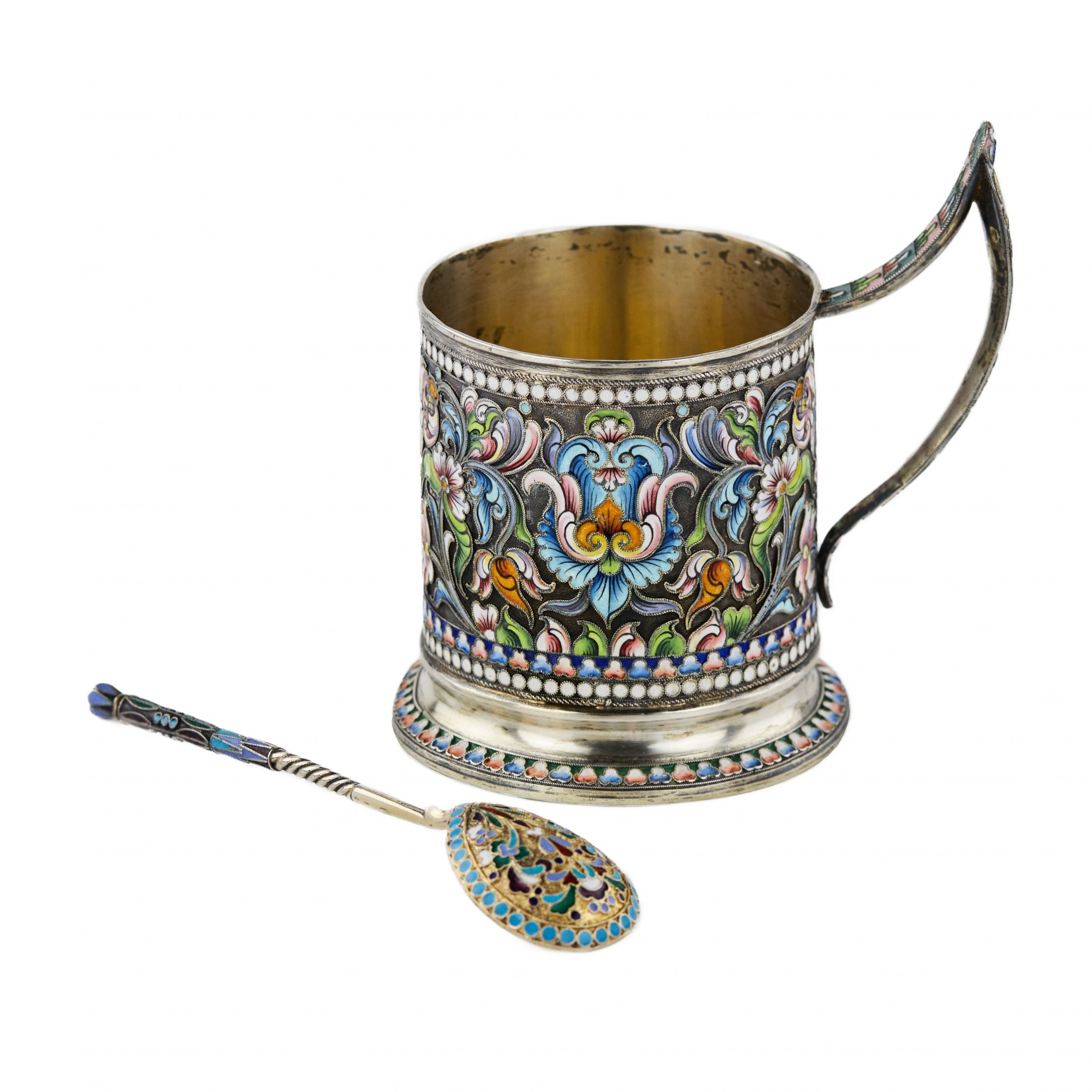 Silver glass holder with a spoon decorated with cloisonne enamel. Moscow 1908-1917.