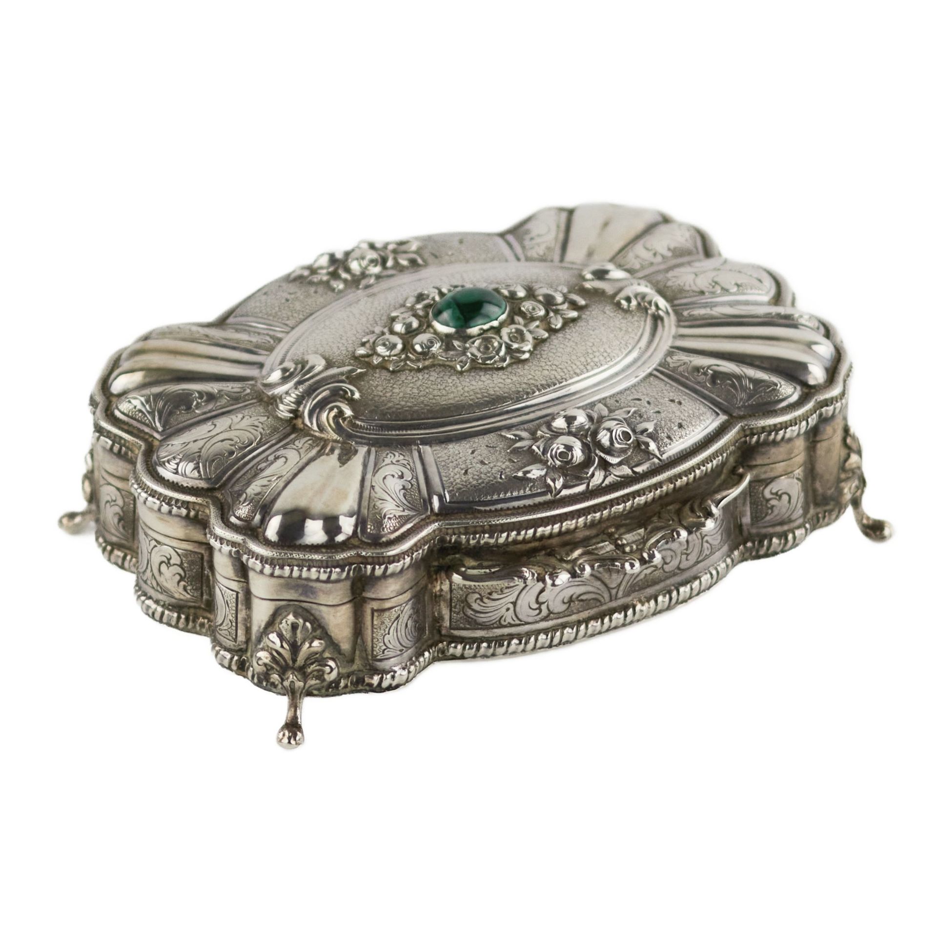 Italian, silver jewelry box of baroque shape. 20th century.