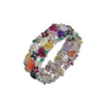 Tutti frutti style gold bracelet with precious stones.