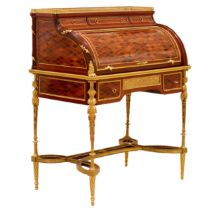 E.KAHN. A magnificent cylindrical bureau in mahogany and satin wood with gilt bronze.