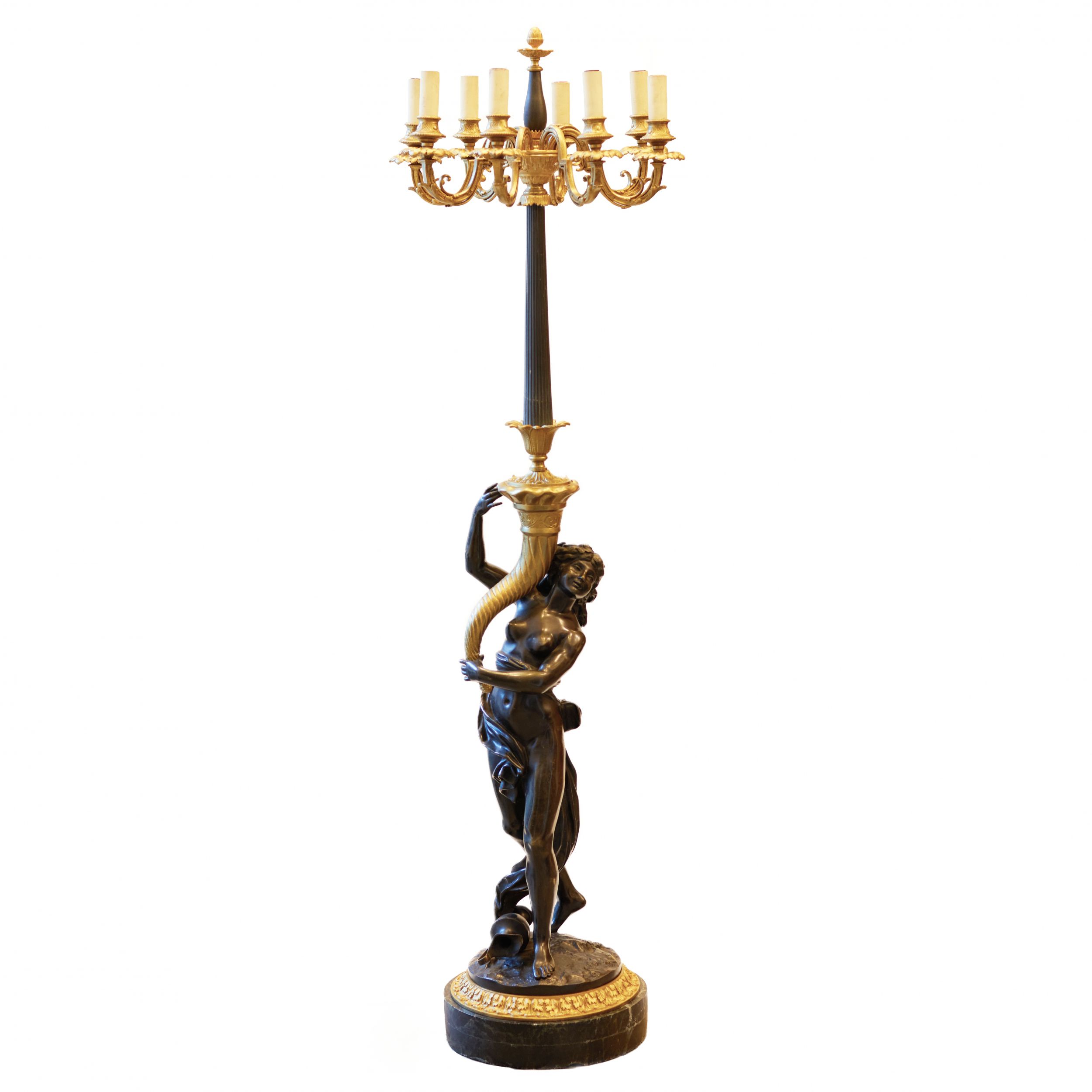 French floor lamp made of gilded and patinated bronze. The turn of the 19th and 20th centuries.