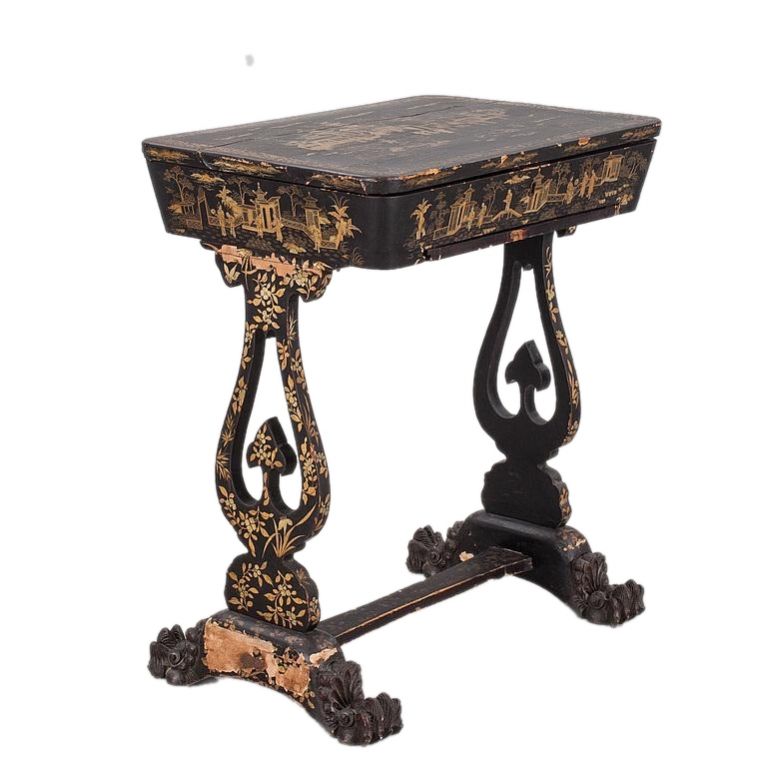 A table for needlework, covered with black lacquer and gold plated. China. Qing Dynasty, Turn of the