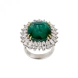 White gold ring with emerald and diamonds.