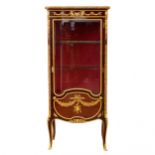 Showcase in mahogany and gilded bronze in Sormani style. France 19th century.