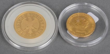 Zwei Goldmünzen, ca. 19 g.