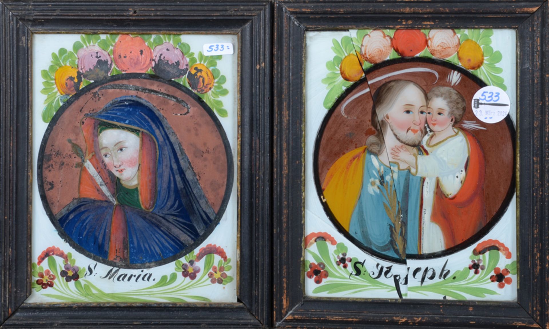 „S. Maria“ und „S. Joseph“. Süddeutsch 19. Jh. Zwei Hinterglasmalereien, gerahmt, je 23,5 x 18,5 cm.