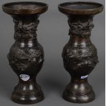 Paar Vasen. Asien. Bronze, mit Reliefdekor, H=je 29,5 cm.