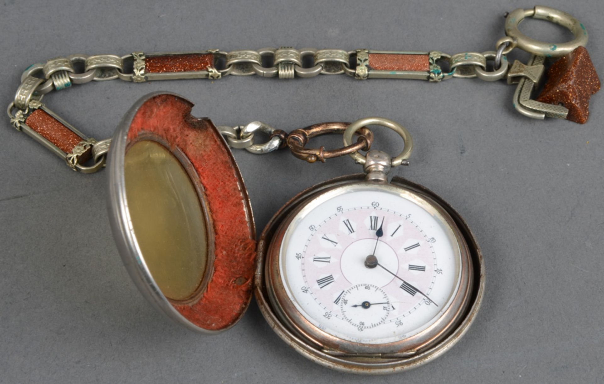 Herrentaschenuhr mit doppeltem Schlüsselaufzug, Silbergehäuse mit Steinbesatz; dazu versilberte