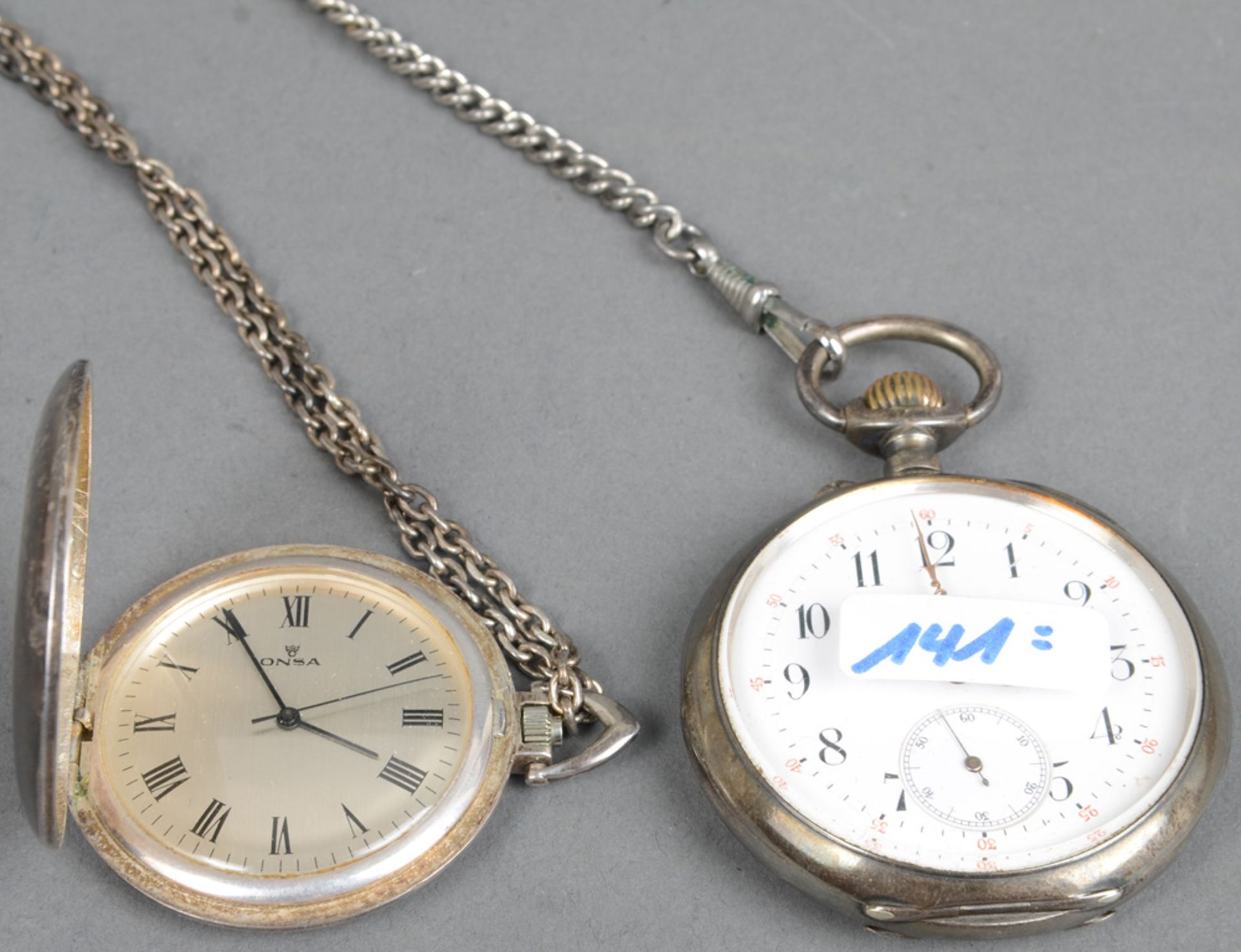 Zwei Taschenuhren, Marke „Onsa“. Schweiz 20. Jh. Eine 900er Silber, die andere versilbert, mit Krone