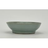 A Chinese celadon waterpot, 16TH/17TH Century Pr. 