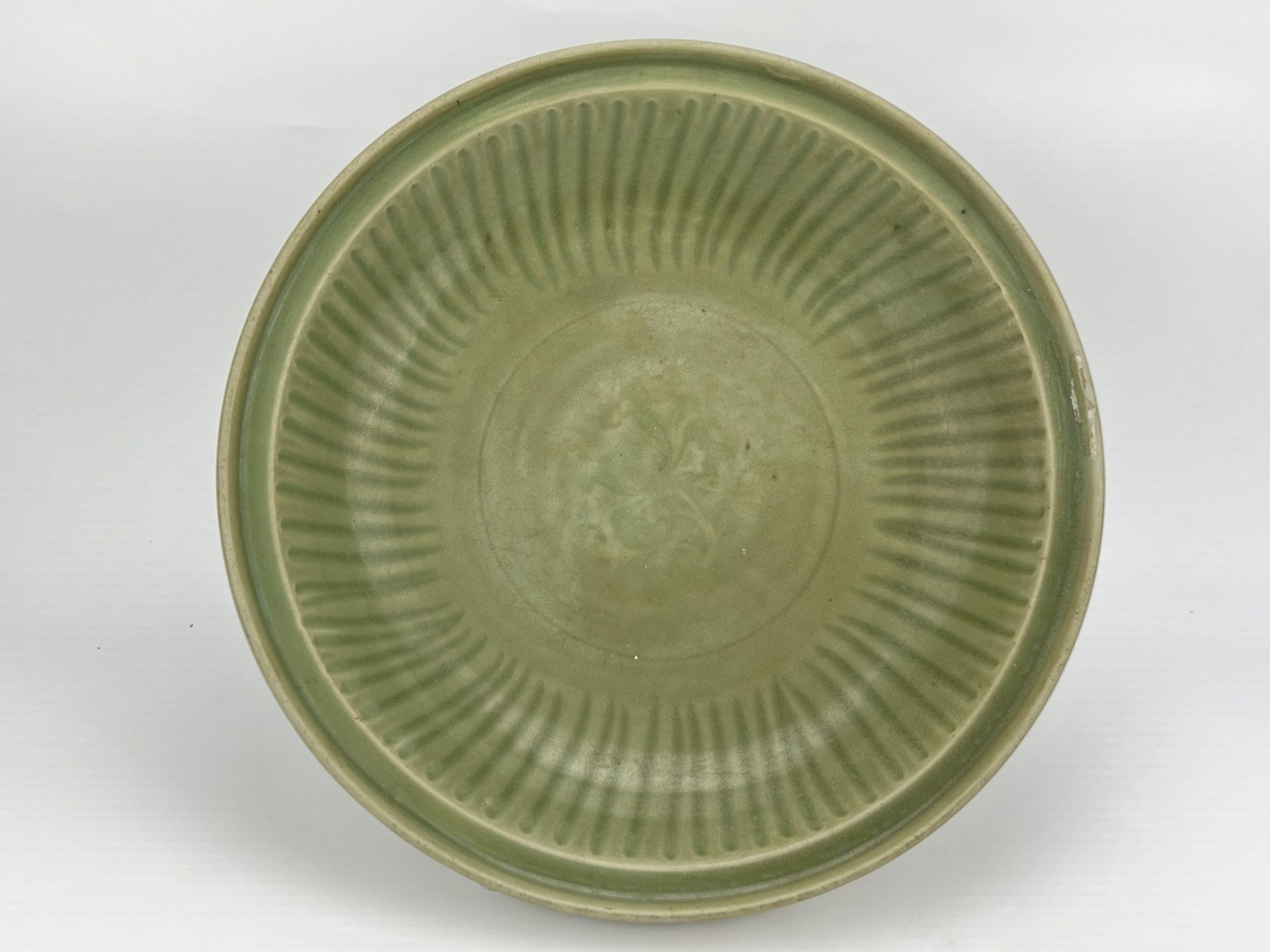 A Chinese celadon dish, 16TH/17TH Century Pr. 