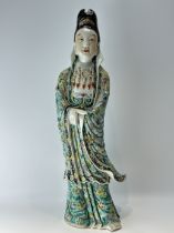 A Chinese porcelain figure, 17TH/18TH Century Pr.