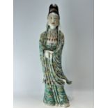 A Chinese porcelain figure, 17TH/18TH Century Pr. 