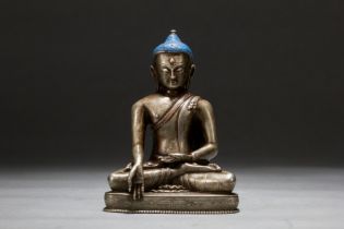 A Chinese silver buddaha figure, 17TH/18TH Century Pr.