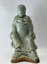A Chinese porcelain figure, 17TH/18TH Century Pr.