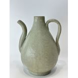 A Chinese celadon teapot, 16TH/17TH Century Pr. 