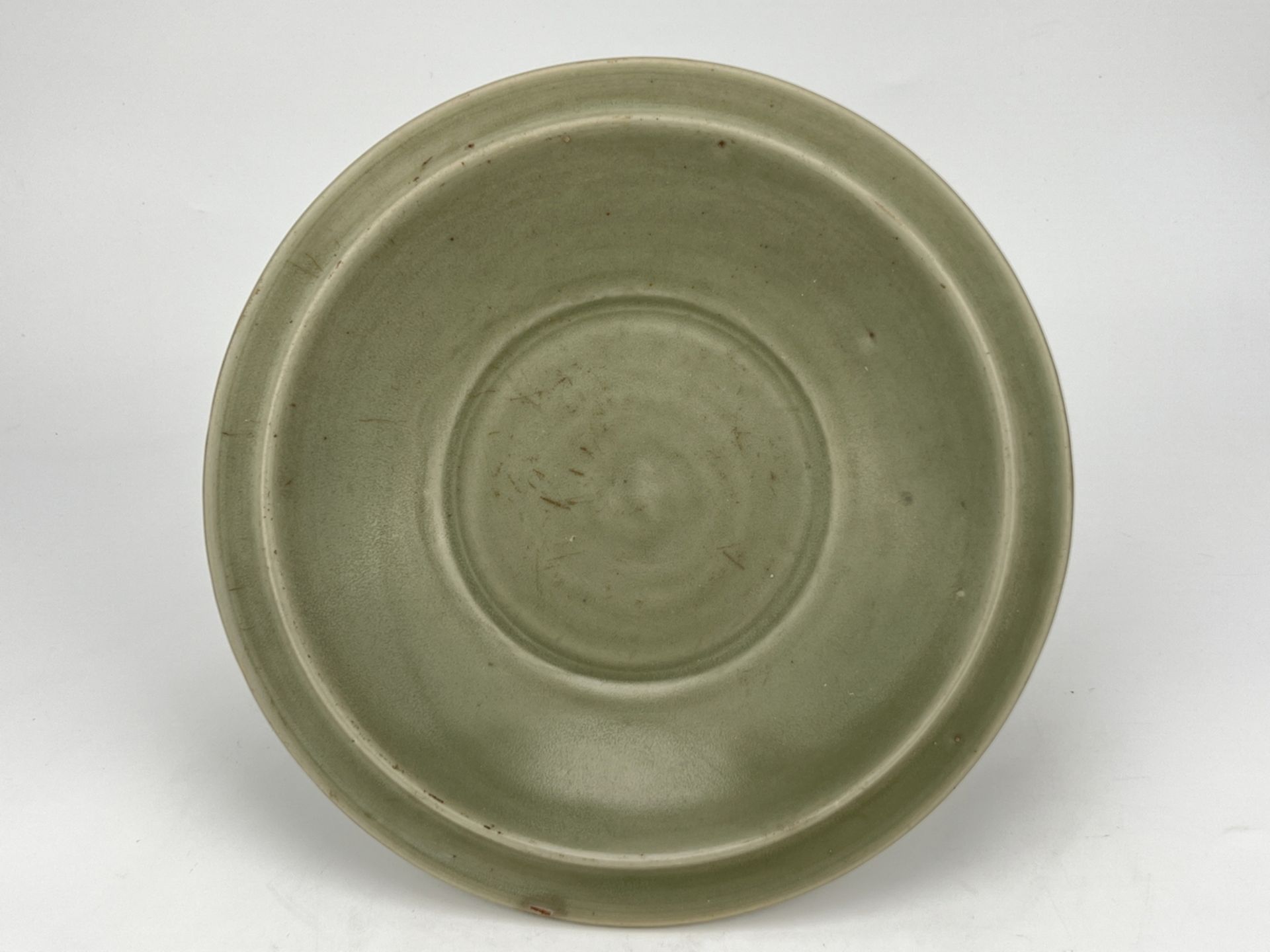 A Chinese celadon waterpot, 16TH/17TH Century Pr. 