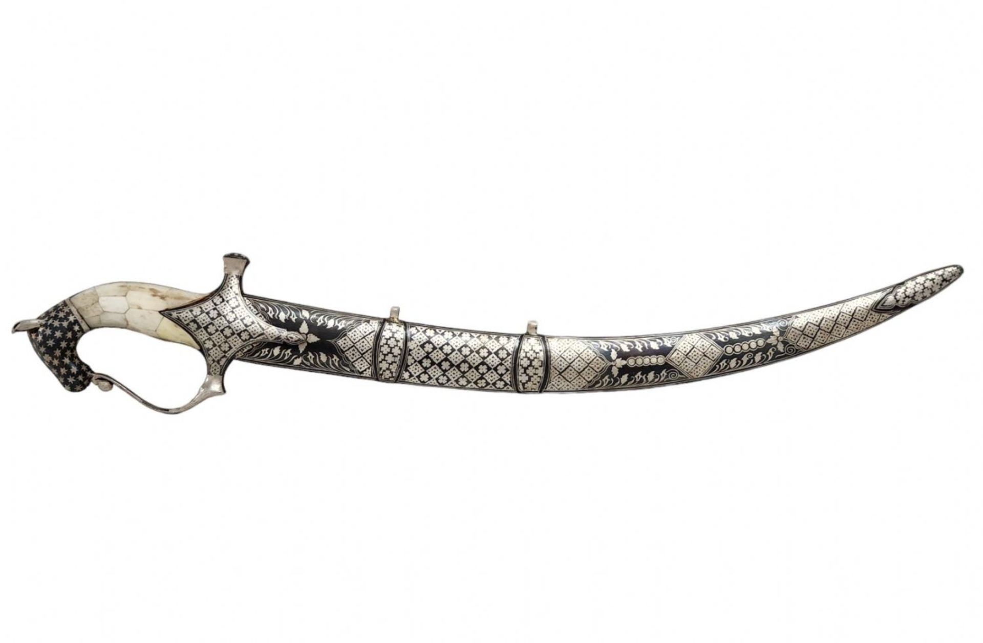 Decorative sword, made of metal and pieces of bone, decorated. Total length: 65 cm. Total width: