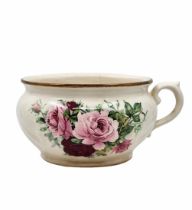 English night pot, in an antique style, decorated with a print of roses on a cream tone background