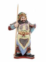 Chinese porcelain statue, a statue in the form of a warrior, made in the Jingdezhen province, around