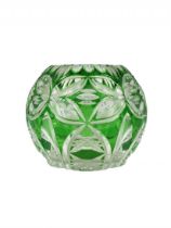 Crystal vessel, spherical vessel, decorated with 'Cut to Clear' , hand polishing on a green