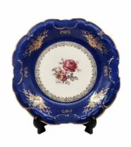 German porcelain plate, made by 'Mayer Wiesau', decorated with a floral and gold print on a cream