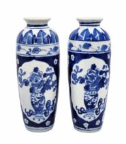 A pair of Chinese porcelain vases, decorated with cobalt blue hand painting, unsigned. Width: 10 cm.