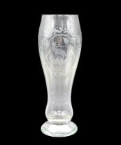 Bohemian beer glass, an antique cup made of glass and decorated with hand engraving in the model