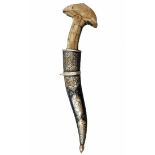 Decorative dagger, made of metal and bone. Length: 32 cm. Width: 8 cm. Period: 20th century