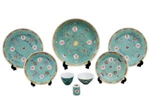 Parts of a Chinese porcelain set, model 'Longevity' (Mun Shou), light blue, decorated with enamel,