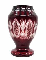 Crystal vase, made of layered crystal in a burgundy shade on transparent. Decorated with a polish of