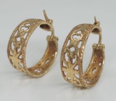 A pair of gold earrings, made of 14 karat gold. Not signed but the purity of the gold has been